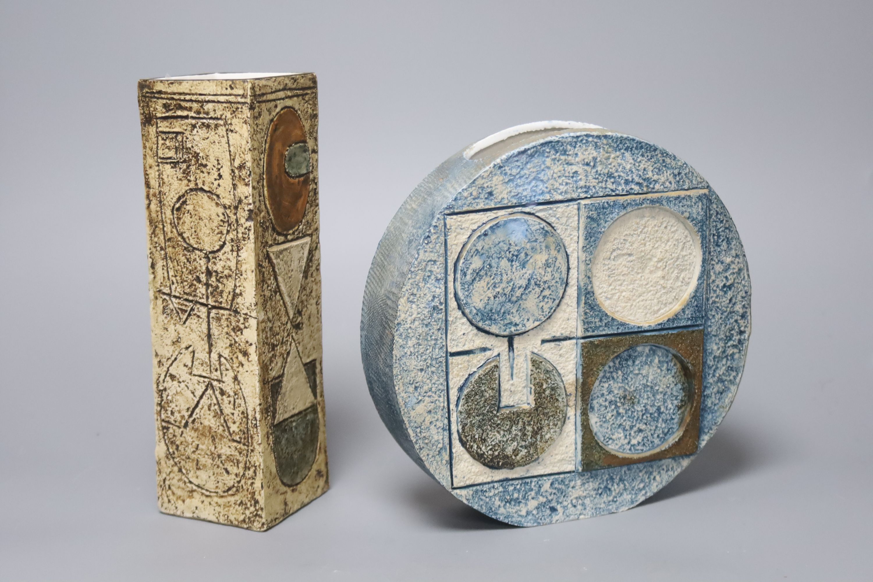 A Troika slab vase by Penny Black, together with a blue Troika wheel vase, monogrammed HC, tallest 22cm